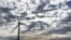 A Block Island Wind Farm turbine operates, Dec. 7, 2023, off the coast of Block Island, Rhode Island, during a tour of the North Fork Wind farm organized by Ørsted.