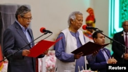 FILE - Bangladeshi President Mohammed Shahabuddin administers oath-taking ceremony of Nobel laureate Muhammad Yunus as the country’s head of the interim government in Bangladesh at the Bangabhaban, in Dhaka, Bangladesh, Aug. 8, 2024.