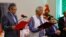 FILE - Bangladeshi President Mohammed Shahabuddin administers oath-taking ceremony of Nobel laureate Muhammad Yunus as the country’s head of the interim government in Bangladesh at the Bangabhaban, in Dhaka, Bangladesh, Aug. 8, 2024.