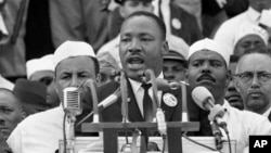 FILE - Martin Luther King Jr. addresses marchers during his 'I Have a Dream' speech at the Lincoln Memorial on Aug. 28, 1963, in Washington.