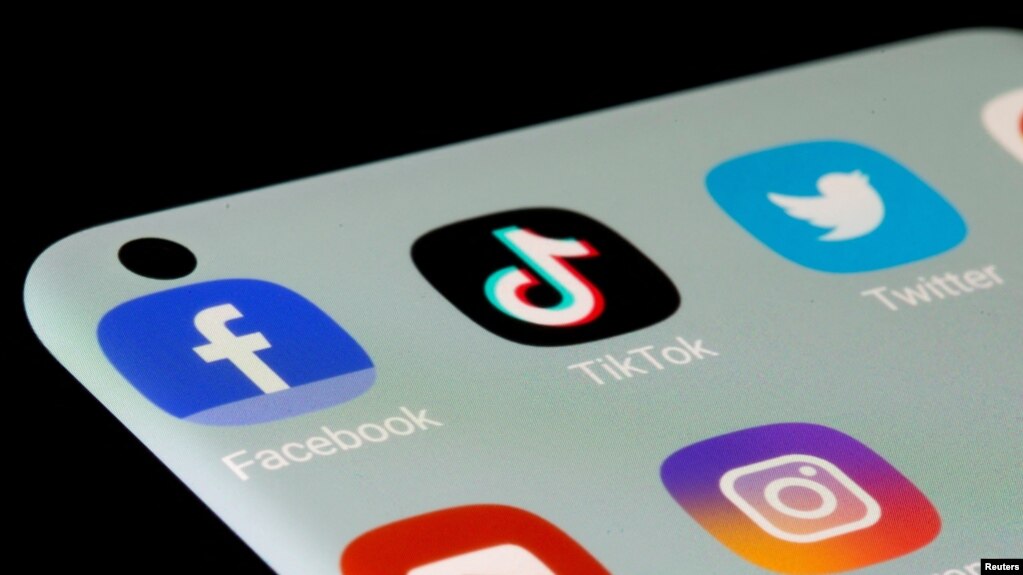 FILE - Facebook, TikTok, Twitter, YouTube and Instagram apps are seen on a smartphone in this illustration taken July 13, 2021.