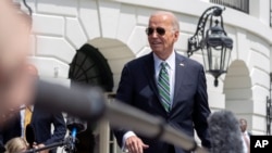 FILE - President Joe Biden speaks to reporters as he departs the White House in Washington for a trip to New Orleans, Louisiana, Aug. 13, 2024. 