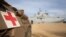 A military medical vehicle stands near the French ship amphibious helicopter carrier Dixmude, amid the ongoing conflict between Israel and the Palestinian Islamist group Hamas, in the city of Al-Arish, Sinai peninsula, Egypt, Jan. 21, 2024. 