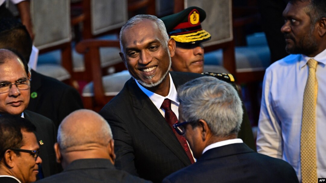 FILE - Maldives' president Mohamed Muizzu leaves his inauguration ceremony in Male, Nov. 17, 2023. He vowed to expel Indian troops deployed in the strategically located archipelago, in his first speech to the nation after being sworn into power. 