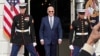 US President Joe Biden enters the south lawn of The White House to pardon two turkeys, in a tradition dating back to the 1970s. 