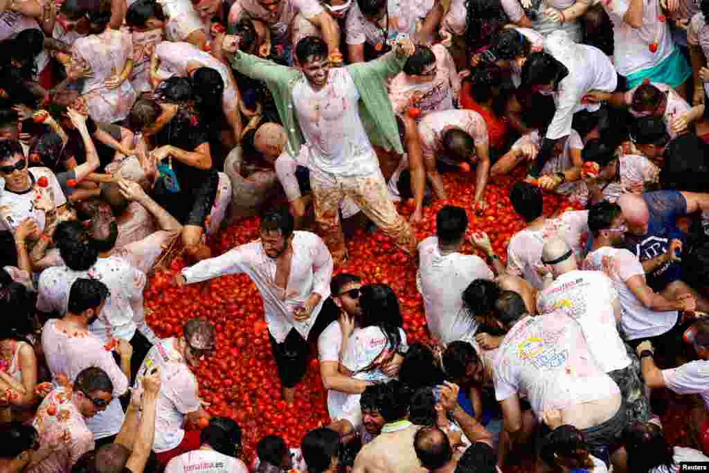 Participants attend the annual food fight festival 'La Tomatina' in Bunol, near Valencia, Spain, Aug. 28, 2024.