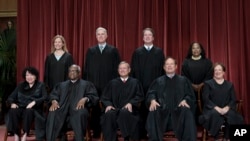 FILE: U.S. Supreme Court justices, Oct. 7, 2022. Bottom from left, Sonia Sotomayor, Clarence Thomas, Chief Justice John Roberts, Samuel Alito, Elena Kagan. Top left, Amy Coney Barrett, Neil Gorsuch, Brett Kavanaugh, and Ketanji Brown Jackson.