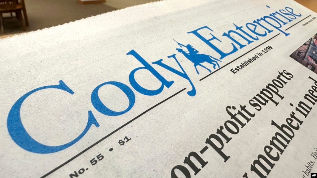 A recent issue of the Cody Enterprise, the Wyoming newspaper where a reporter used artificial intelligence to help write his stories, is seen Tuesday, Aug. 13, 2024, at the Wyoming State Library in Cheyenne. (AP Photo/Mead Gruver)