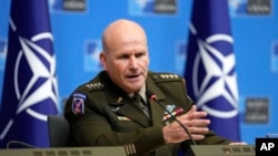 FILE - General Christopher Cavoli, NATO's supreme allied commander Europe, addresses reporters at NATO headquarters in Brussels, Jan. 18, 2024. Resolution of the war in Ukraine won't end the Russian threat in Europe, Cavoli said July 18, 2024, at the Aspen Security Forum.