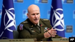 FILE - General Christopher Cavoli, NATO's Supreme Allied Commander Europe, addresses a media conference at NATO headquarters in Brussels, Jan. 18, 2024.