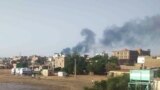 FILE: Smoke rises over Khartoum, Sudan, June 23, 2023, as clashes continued between warring factions in and around Sudan's capital. The fighting continued on Monday, June 26.