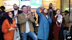 Supporters of the shaky movement cheer during an election night rally on February 27, 2024 in Dearborn, Michigan.
