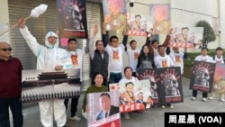 抗議者下車，圍繞中國駐三藩市總領事館遊行抗議。 （周星晨）