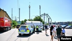 Police officers work at the scene after a roller coaster accident took place at an amusement park, according to the police, in Stockholm, Sweden, June 25, 2023. (Claudio Bresciani/TT News Agency/via Reuters)