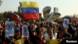 People march in support of Venezuela's opposition coalition that continues to push for recognition of what it says is its resounding victory in last month's presidential election, in Buenos Aires, Argentina, Aug. 17, 2024.