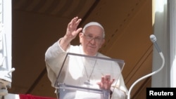 Pope Francis leads the Angelus prayer from his window, at the Vatican, Nov. 5, 2023. (Vatican Media/­Handout via Reuters) 