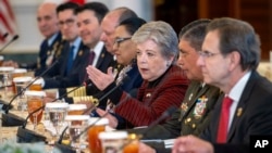 Mexican Foreign Secretary Alicia Barcena, third from right, speaks with U.S. Secretary of State Antony Blinken, not pictured, at the U.S. State Department in Washington, Jan. 19, 2024. 