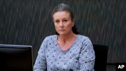 FILE - Kathleen Folbigg appears via video link during a convictions inquiry at the NSW Coroners Court, Sydney, Wednesday, May 1, 2019. 