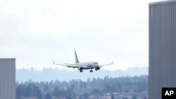 An Alaska Airlines Boeing 737-990ER flight 337 from Fort Lauderdale, Florida, lands at Portland International Airport in Portland, Oregon, Jan. 6, 2024. Federal officials have ordered the grounding of some Boeing 737 Max 9 jetliners until they are inspected.