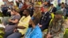 Servicemen attend a ceremony to repatriate five crates of sacred human relics, seized in New York by the FBI in 2016 from a deceased art collector, in Port Vila, Vanuatu Aug. 29, 2024