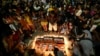 FILE - Guarani Indigenous people and activists attend a vigil in Sao Paulo, Brazil, June 23, 2022, asking for justice in the deaths of British journalist Dom Phillips and Indigenous expert Bruno Pereira.