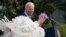 President Joe Biden pardons the national Thanksgiving turkeys, Liberty and Bell, during a ceremony on the South Lawn of the White House in Washington, Nov. 20, 2023. 