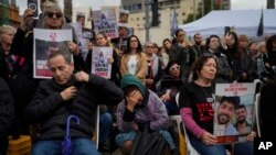 People attend a 24 hour rally calling for the release of the hostages kidnapped by Hamas militants into the Gaza Strip, in Tel Aviv, Israel, Jan. 14, 2024. 