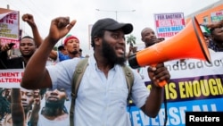 Des manifestants protestent contre la mauvaise gouvernance et les difficultés économiques à Lagos, au Nigeria, le 1er août 2024.