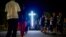 FILE - The faithful attend a 'Via Crucis' (Way of the Cross) at the St. Gabriele dell'Addolorata sanctuary in Isola del Gran Sasso near Teramo in central Italy, July 29, 2023.