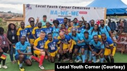FILE - Participants of the Sports Jamboree hosted by the Loyal Youth Corner pose for a picture, Yaoundé, July 1, 2023