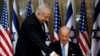FILE - U.S. Vice President Joe Biden (R) prepares to sign the guest book before his meeting with Israel's Prime Minister Benjamin Netanyahu at Netanyahu's residence in Jerusalem March 9, 2010. 