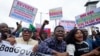 People protest Nigeria’s worst cost-of-living crisis, in Lagos, Aug. 1, 2024. 