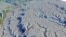 This image produced with laser measuring shows complexes of rectangular platforms arranged around low squares in Ecuador's Upano Valley. Archaeologists have found a cluster of lost cities in the rainforest, according to a paper published Jan. 11, 2024, in the journal Science.