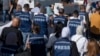 FILE — Palestinian journalists are seen during a protest march heading toward a United Nations office in the West Bank city of Ramallah, Nov. 7, 2023.