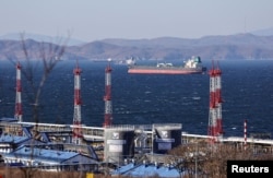 FILE - A crude oil tanker lies at anchor near the terminal Kozmino in Nakhodka Bay near the port city of Nakhodka, Russia, Dec. 4, 2022. Pakistan is to receive a shipment of Russian crude oil in June 2023.