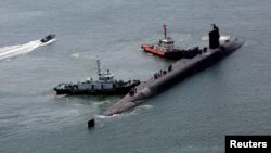 미 해군의 오하이오급 핵 추진 순항미사일 잠수함인 SSGN ‘미시간함’이 16일 부산 작전기지에 입항했다.