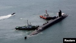 미 해군의 오하이오급 핵 추진 순항미사일 잠수함인 SSGN ‘미시건함’이 16일 부산 작전기지에 입항했다.