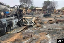 FILE - This picture taken on Sept. 1, 2023, shows a view of destruction in a livestock market area in al-Fasher, the capital of Sudan's North Darfur state.