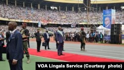 President Felix Tshisekedi is sandwiched by his security detail at the Stade de Martyrs, or Martyrs Stadium during his inauguration for a second term in Kinshasa, DR Congo on January 20, 2024.