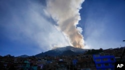 The sun rises during a forest fire on El Cable Hill in Bogota, Colombia, Jan. 25, 2024.