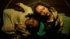 Aktris Lidya Jewett, kiri, dan Olivia O'Neill dalam sebuah adegan di "The Exorcist: Believer." (Universal Pictures/AP)