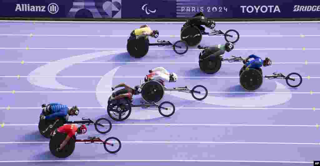 Thailand&#39;s Chaiwat Rattana leads in the para athletics men&#39;s 100m - T34 final at the Stade de France at the Paris 2024 Paralympic Games, Paris, France, Sept. 2, 2024.