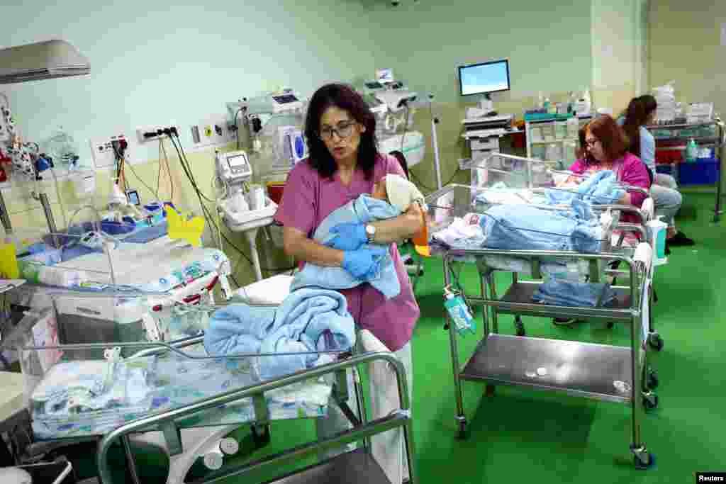 Medical staff attend the newborns at an underground medical bunker at the Galilee Medical Center near Israel&#39;s border with Lebanon in northern Israel.