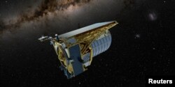 An artist's concept shows the Euclid space telescope, built by the European Space Agency (ESA) that is set to be launched by a SpaceX Falcon 9 rocket, in operation, in this undated handout image. European Space Agency (ESA)/Handout via REUTERS 