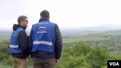 EU monitors overlooking Khurvaleti village, half of which is in the breakaway region of South Ossetia. (Lisa Bryant/VOA)