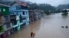 Flood waters inundate buildings along the Teesta River in Sikkim, India, Oct. 4, 2023. 
