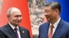 Kineski predsjednik Xi Jinping, desno, i ruski predsjednik Vladimir Putin rukuju se prije razgovora u Pekingu, 16. maja 2024