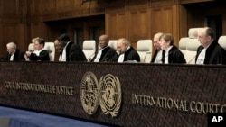 Sudije Međunarodnog suda pravde u Hagu pred kojima su govorili pravni timovi Južnoafričke Republike i Izraela (Foto: AP/Patrick Post)