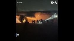 日航班机羽田机场擦撞海上保安厅飞机后烧毁 客机上数百人全部安全逃生