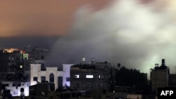 Smoke billows following an Israeli strike in Rafah in the southern Gaza Strip on Dec. 8, 2023